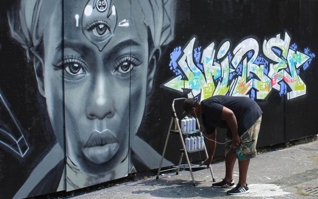 Free wall painting at the 3rd EyE Open Hip Hop Festival. Photo by Justin Botelho. August 3rd EyE Open Hip Hop Festival free wall painting.