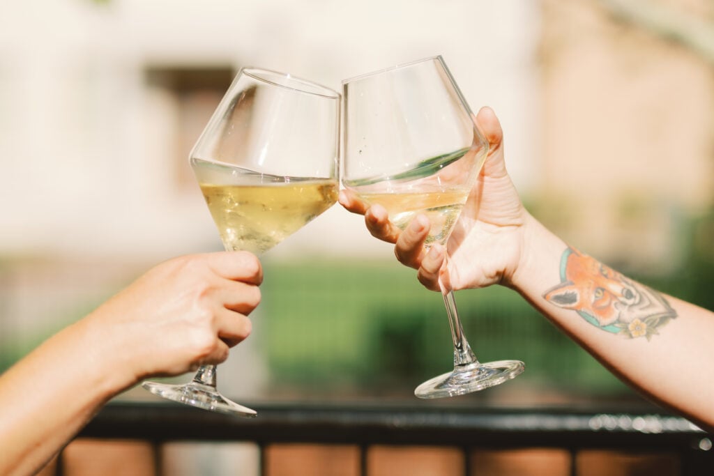 Cheers at Coastal Bubbles + Wine Bar. Photograph by Maggie Howland.